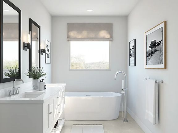 Freestanding vanity and tub in primary bath