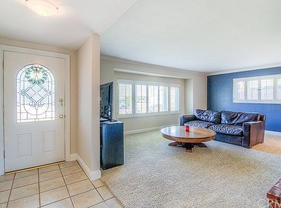 Tons of natural light, Crown and base molding, Plantation Shutters.