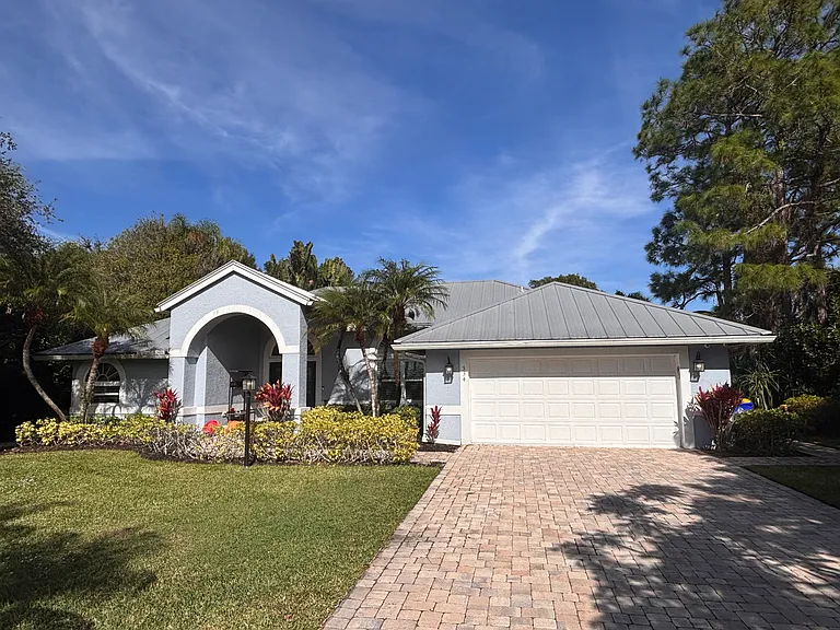 Beautiful welcoming entry with long drive way