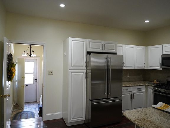 Kitchen - GE stainless steel appliances - garbage disposal and dishwasher