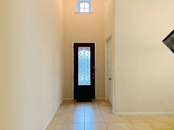 Entrance w/ tall 8ft door