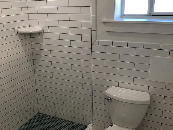 Gorgeous subway tile and penny tile
