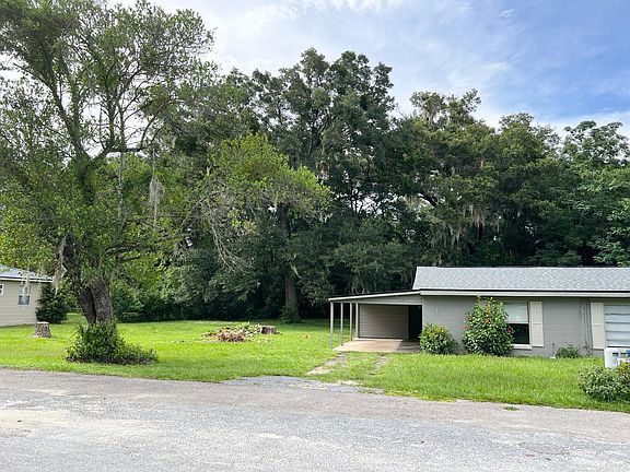 Front Angled Photo showing 1313 NE 33rd and large usable yard