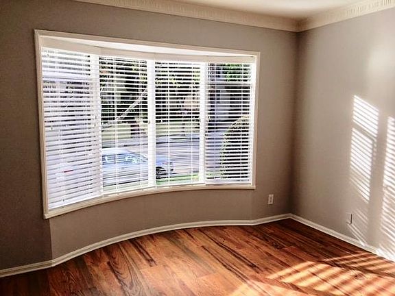 CUSTOM SHUTTER WINDOW COVERINGS THROUGHOUT