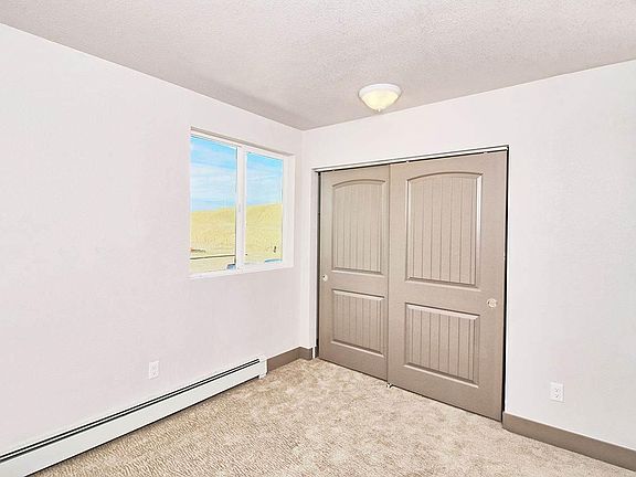 Carpeted bedroom #2 with double closet.