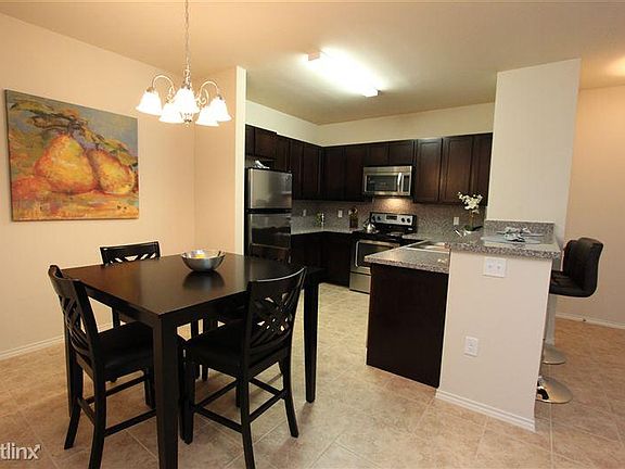 4th image of 7619 King Arthurs Ct