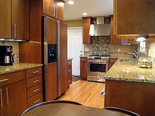Gourmet appliances, granite counters, and custom cabinetry 
