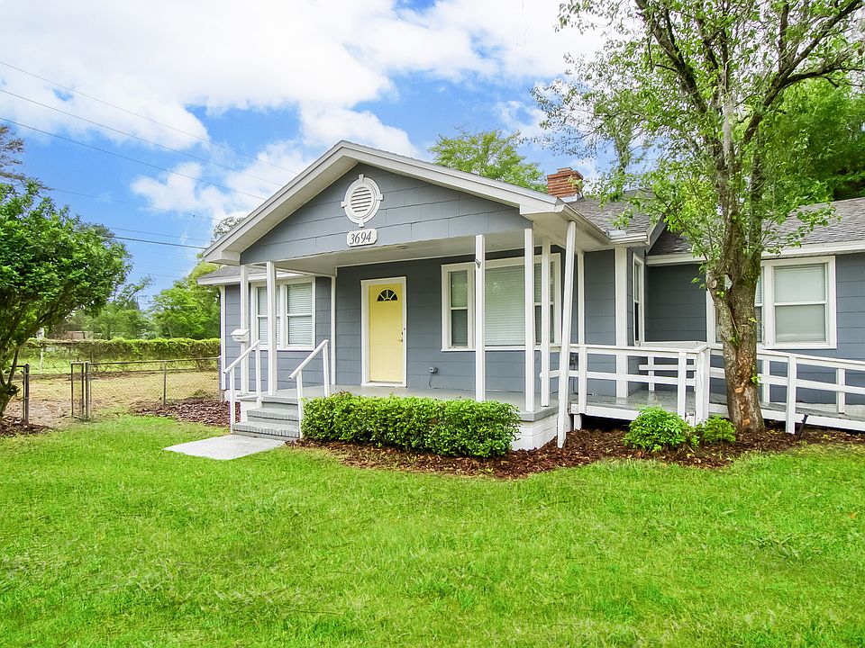 Front Exterior of the Coziest Home. FYI - Digitally enhanced grass.