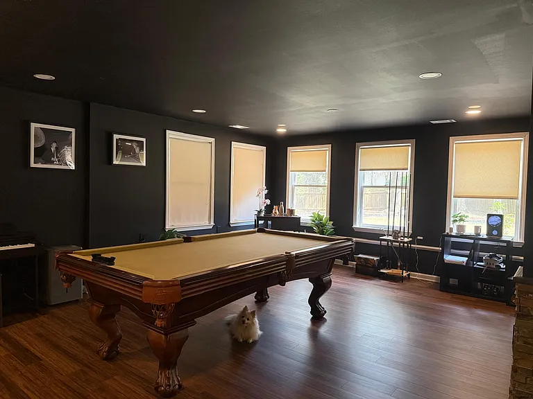 Basement Entertainment Area with Theater and Kitchen