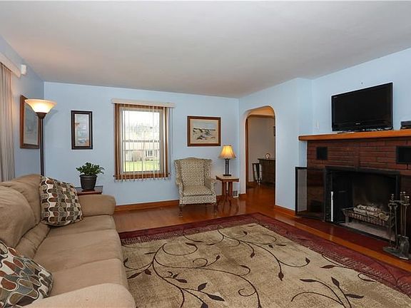LIVING ROOM, WOOD BURNING FIRE PLACE