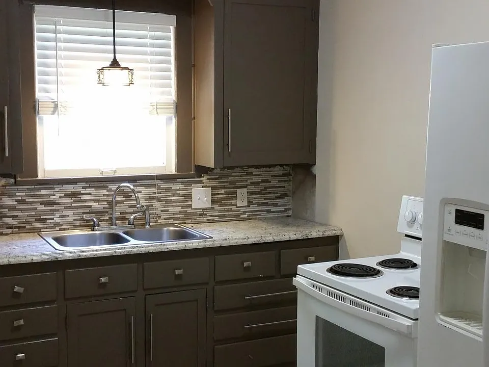 Kitchen with spice pantry built-in, walk-in pantry, back doo