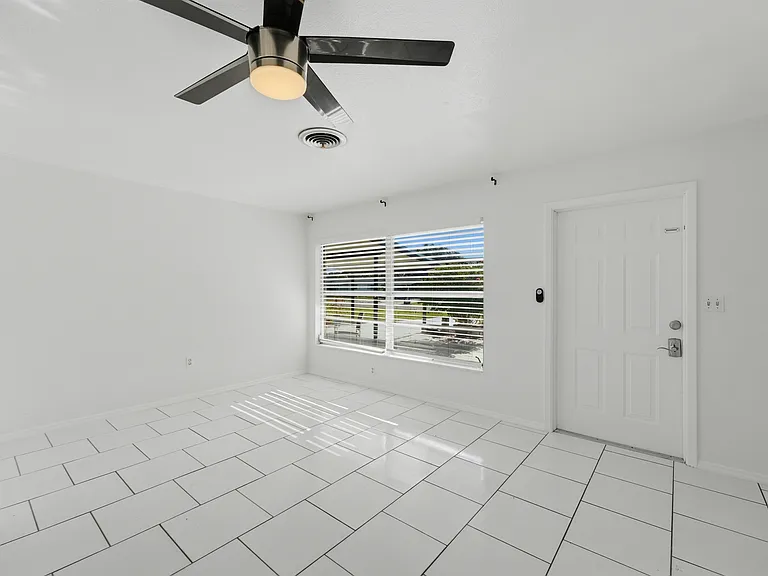 LIVING ROOM-FRONT INTERIOR OF UNIT