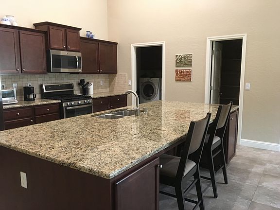 Doors lead to pantry&laundry