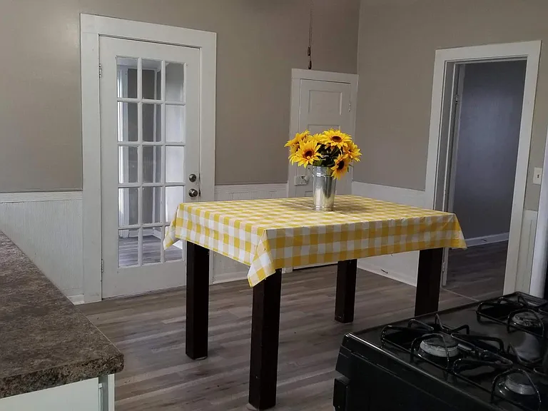 Kitchen looking toward laundry room, walk in pantry and Master Bedroom