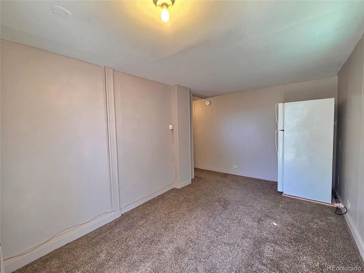 Building Photo - 10110 E 120th Ave #5
