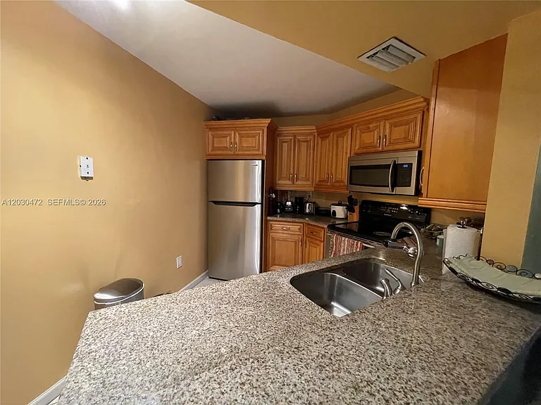 9711 Fontainebleau Blvd #D203 — Photo 7