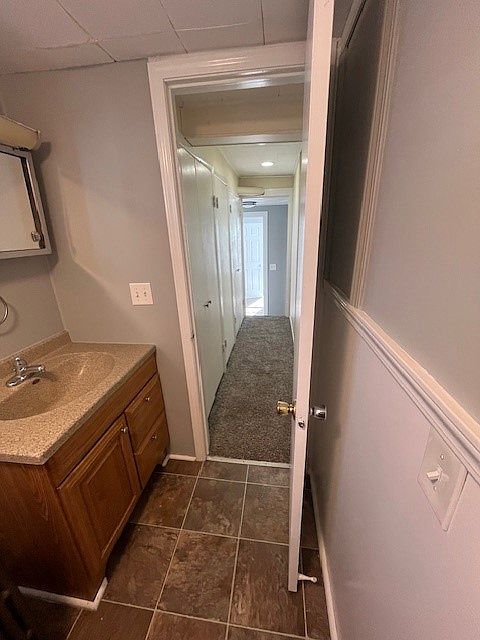 Shower, no tub
hallway with storage