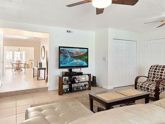 Family Room with furniture and washer and dryer area