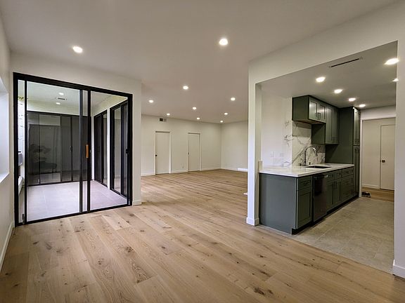 Large dining space adjacent to ample kitchen