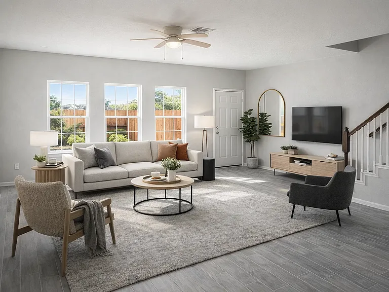 Living room with door to back yard and AI furnishings.