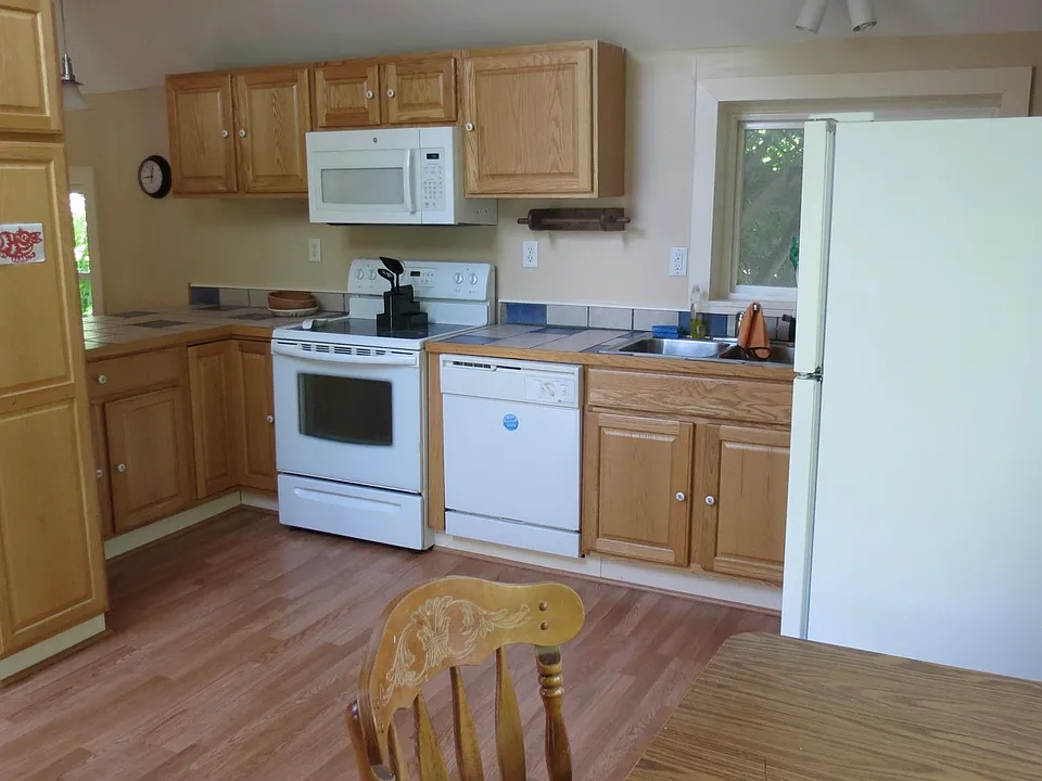 An overhead skylight in the kitchen and lots of windows make