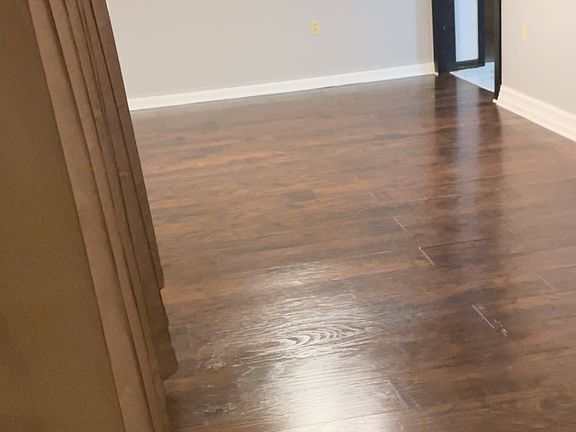 Just to your left when you walk in the front door, front living area and dining area. Cased opening into Kitchen.