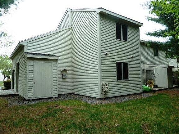 Deck and usable lawn areas to the rear.