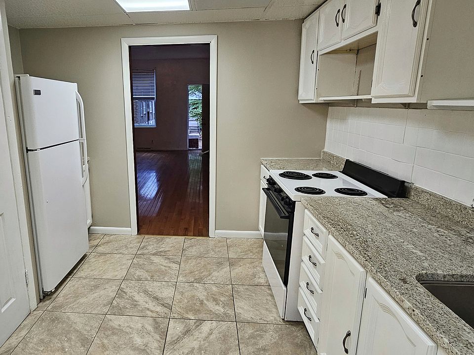 Kitchen with view to living room