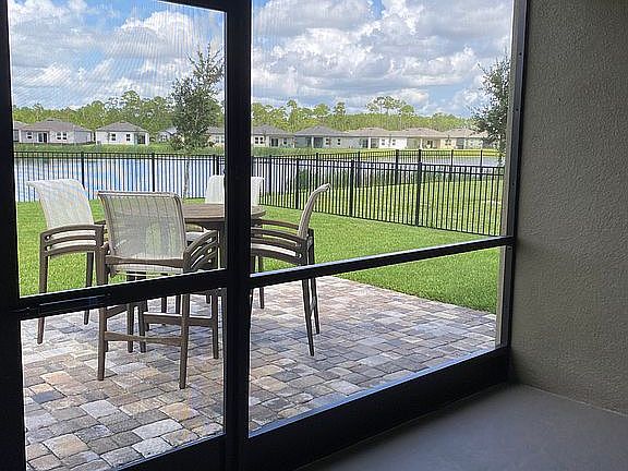 Screened porch under roof
