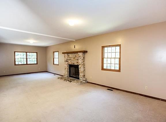 Great Room with beautiful full masonry fireplace...perfect for those chilly fall days.