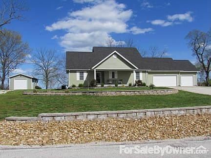 View from road
						:
						Front porch added 2011. New landscaping 2012