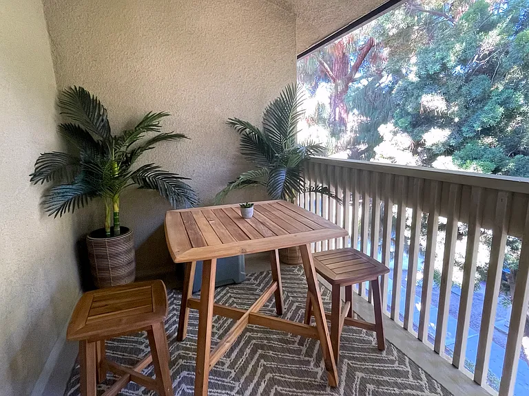 Patio with table and chairs off secondary bedroom