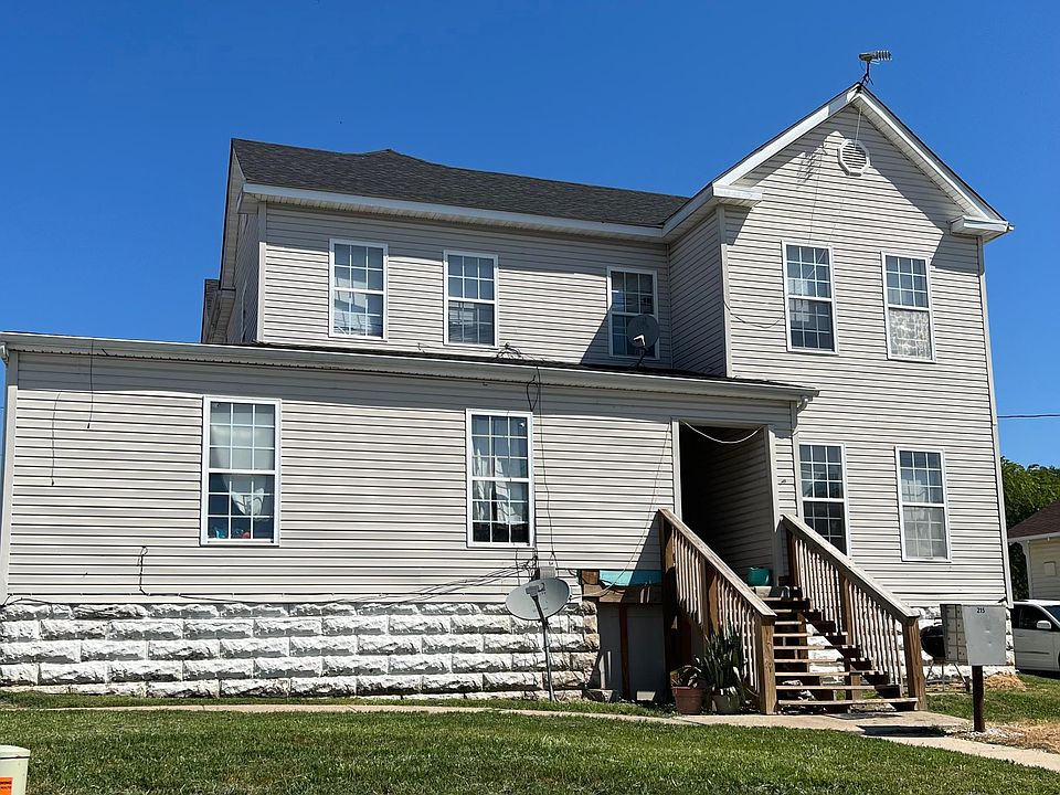 Unit 5 is an upper level unit with exterior stairs leading to the apartment.