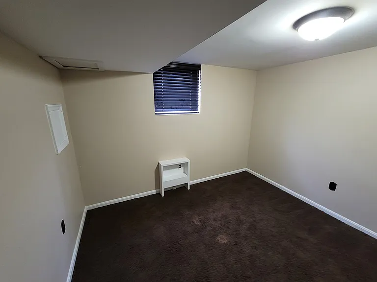 Basement Bedroom
Now has wood flooring. Updated picture coming soon.