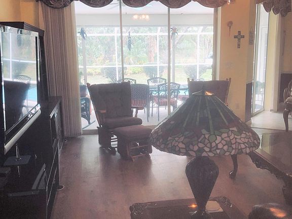 Living Room toward lanai/pool