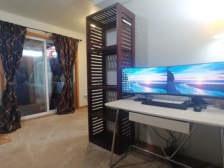 Downstairs bedroom/office or guest suite opens out to covered patio and separate entrance