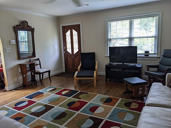 Living room view toward front door