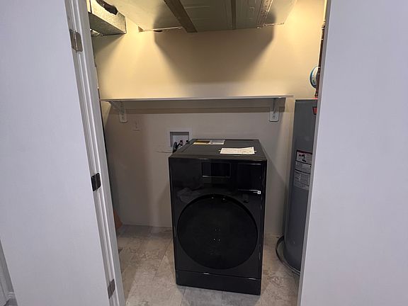 Laundry room with new washer/dryer