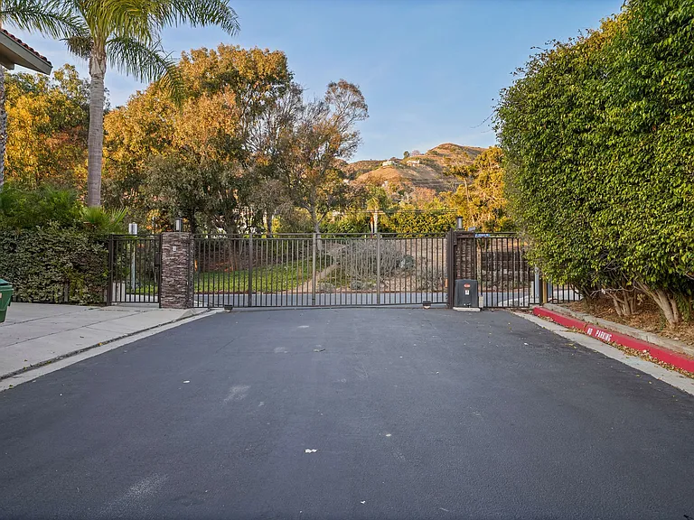 A gated entrance that sets the tone for luxury and seclusion.
