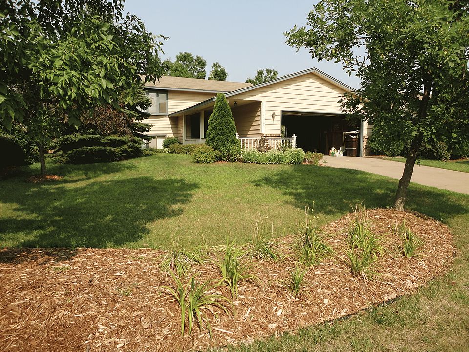 2 car garage and landscaped yard