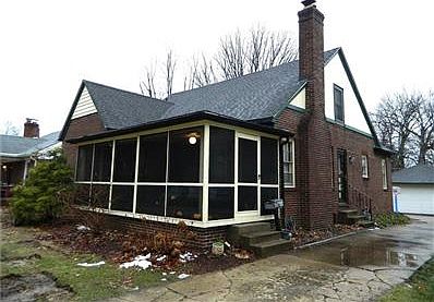 Brick Tudor home in one of Irvington's nicest areas: Par 10. Quiet street located north of Pleasant Run Pkwy, this 3 BR 2 BA home w/2 car garage and partially finished basement is move-in ready!