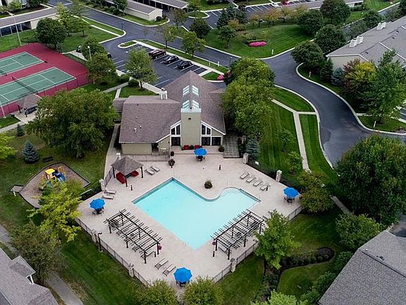 Crisp Pool and Lit Tennis Courts