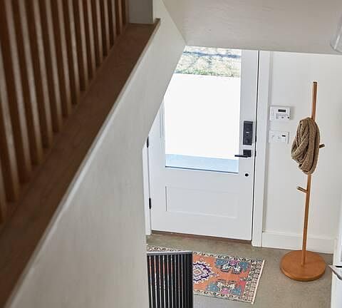 Main entry way with stairs leading to the 2nd floor