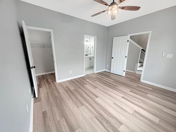 Downstairs bedroom- can be used as Primary Bedroom w/ ensuite attached measures 13x11