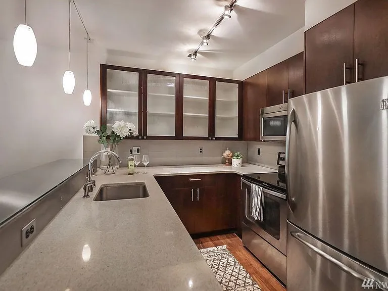 Kitchen with plenty of cabinets and lights