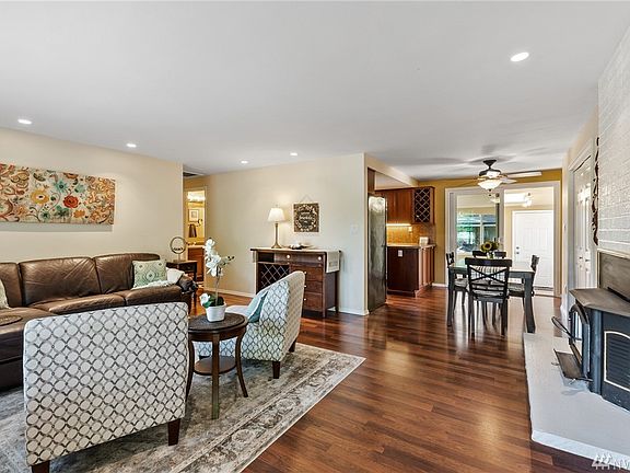 Modern styling, recessed lighting, warm wood floors