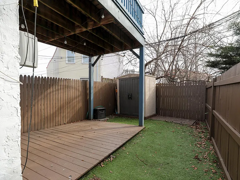 1st floor - Back patio with storage