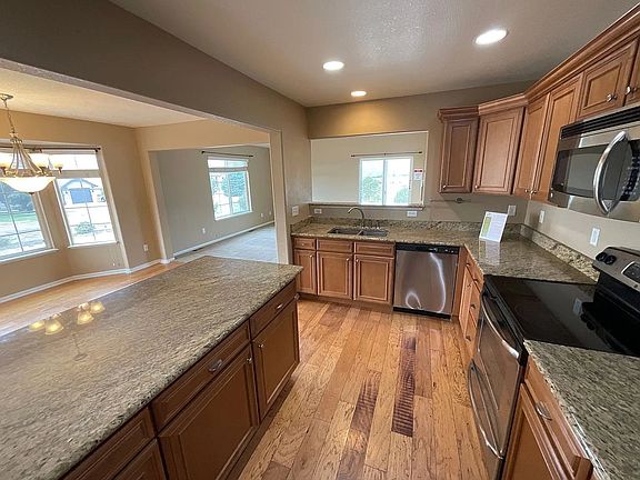 Gourmet kitchen with stainless steel appliances and granite countertops!