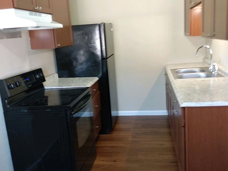 NEW FLOORING, CABINETS AND NEWLY PAINTED