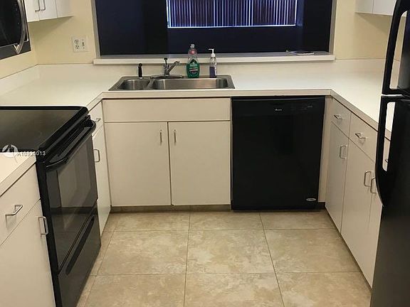 4th image of 9655 N Belfort Cir #211